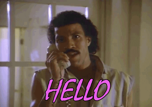 Lionel Richie singing 'hello' into a phone