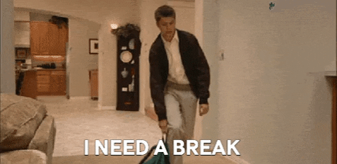 GIF of man falling onto the floor with the caption 'I NEED A BREAK'