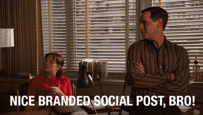 GIF from Mad Men of a group clapping saying 'Nice branded social content, bro'